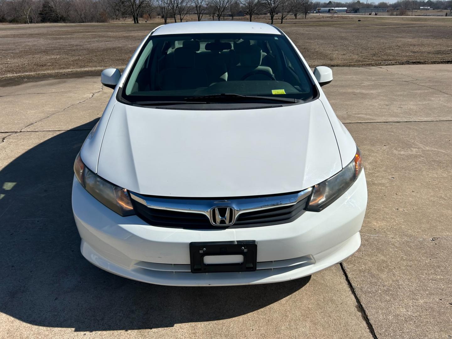 2012 White /Gray Honda Civic CNG Sedan 5-Speed AT (19XFB5F59CE) with an 1.8L L4 SOHC 16V CNG engine, 5-Speed Automatic transmission, located at 17760 Hwy 62, Morris, OK, 74445, (918) 733-4887, 35.609104, -95.877060 - Photo#1